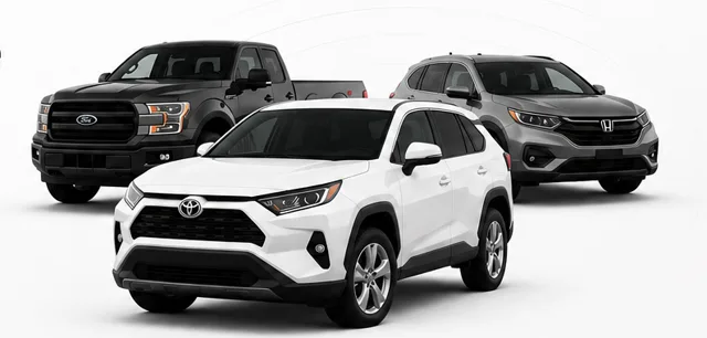 Three new cars in a studio showroom